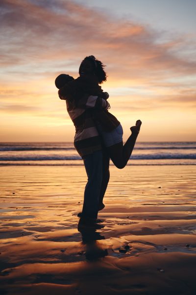 Silhouette Couple, Sunset Beach Love And Hug On Honeymoon, Summer Tropical Vacation And Anniversary